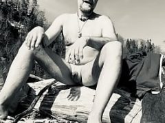 chubby nudist with tiny dick and a beer