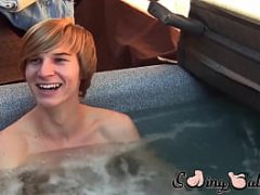 Skinny blond amateur plays with his balls while masturbating