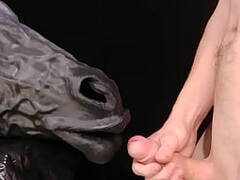 Masturbating young man cumming on a horse mask