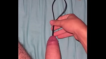 Teen inserts 30inch cord in urethra