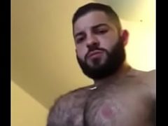 Sexy Latino uncut bear shows off uncut cock
