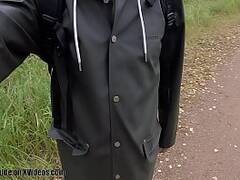Walking with pierced dick out in latex chaps and rain gear