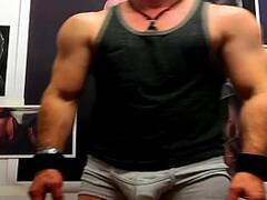 DECLAN STONE flexing and jacking at the Wall of Muscle
