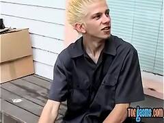 Young punk presents his sexy feet while smoking