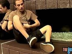 Good looking boy teases with his feet