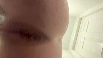 Young boy uses his razor as a dildo while shaving his ass