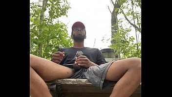 Big dick jerking off on nature path
