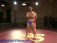 Oiled muscled men wrestling and fucking