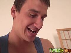 Blond stud has limp dick rubbed by two twink masseurs
