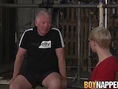 Young sub twink Daniel Hausser tied up in BDSM dungeon