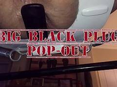 Big Black Plug Pop Out