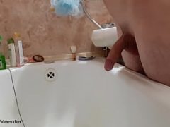 Russian teen pisses in the bathroom jerks off his big cock a