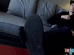 Young man teases with his perfect soles before jerking off