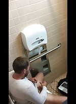 Spy straight guy jerking and cumming in restroom